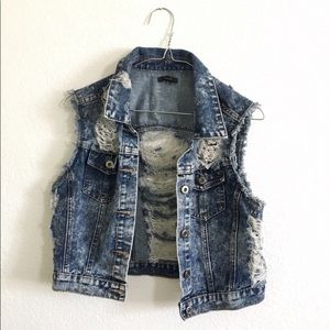Distressed denim vest